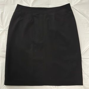 New, never worn, black, pencil, knee length skirt. Size 10.